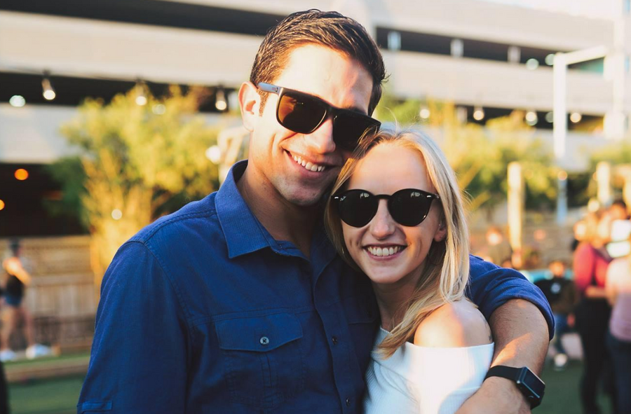 Dennis M. Ferrigno, Jr., founder of Executive Beverage, with his wife at an outdoor event in Virginia Beach.