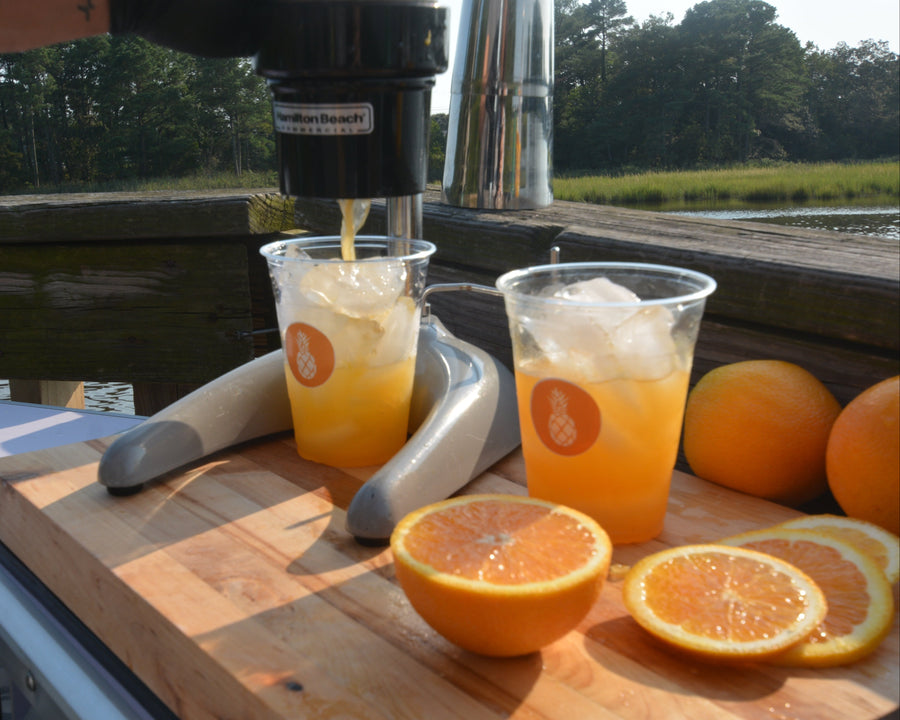An Executive Beverage Crush Kit with crusher, bar tools and fresh fruit