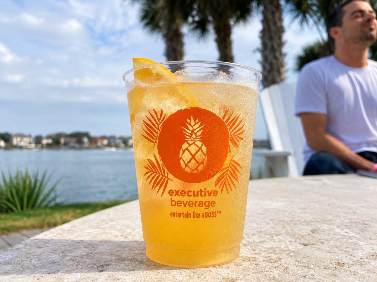 A fresh pressed orange crush in an Executive Beverage cup on the waterfront in Virginia Beach