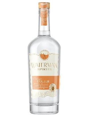 A bottle of Waterman's Spirits Perfect Crush liqueur, the spirit used in an Executive Beverage fresh pressed orange crush.