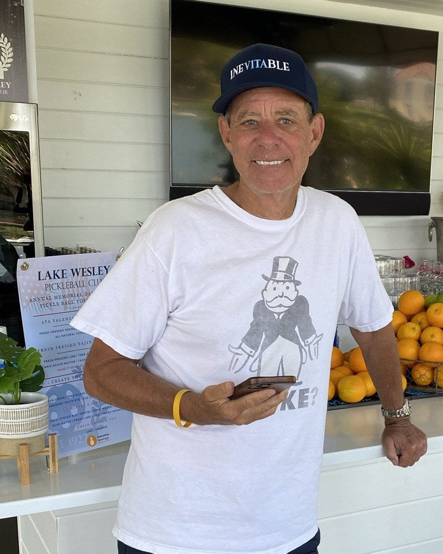 Bruce Thompson, CEO of Gold Key | PHR and Executive Beverage’s first client, beside an Executive Beverage bar set with fresh oranges.