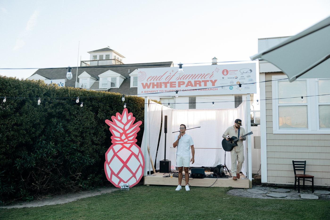 An outdoor tented Executive Beverage bar at a grand opening celebration